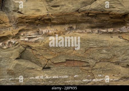 Die Felsen sind farbenfrohe Felsformationen, die sich über Hunderte von Jahren abgelagert haben. Hintergrund und Textur. Hochwertige Fotos Stockfoto