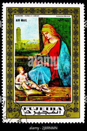 MOSKAU, RUSSLAND - 14. MAI 2022: Briefmarke gedruckt in Fujairah (Fujeira) zeigt Jungfrau und Kind, Madonna-Malereiserie, um 1972 Stockfoto