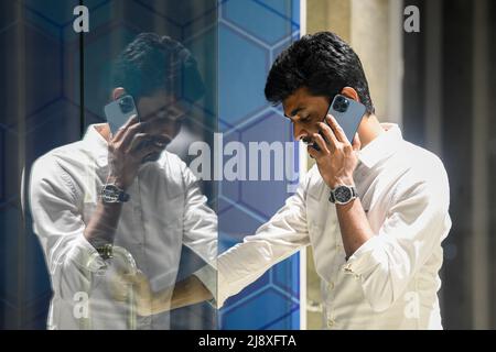 Dhaka, Bangladesch. 18.. Mai 2022. Ein Mann benutzt sein iPhone 13 pro in einem Büro. Kredit: SOPA Images Limited/Alamy Live Nachrichten Stockfoto