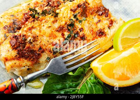 Fischfilet in Orangenöl gebraten, Fischgericht Stockfoto