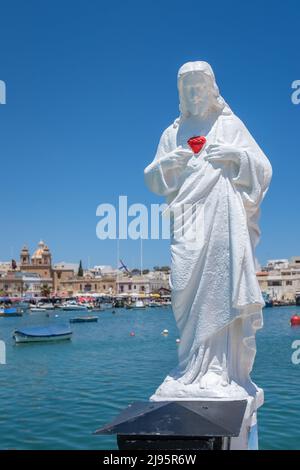 Statue des Heiligen Herzens Jesu, Marsaxlokk, Malta Stockfoto