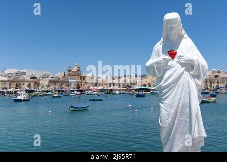 Statue des Heiligen Herzens Jesu, Marsaxlokk, Malta Stockfoto