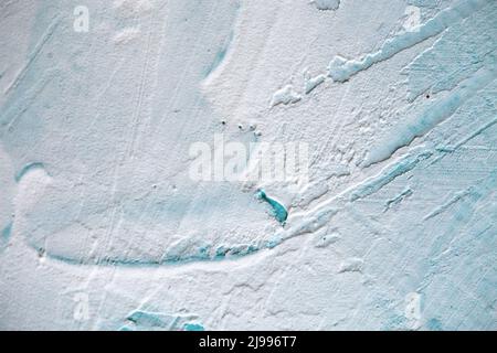 Strukturierte Wand mit einem blauen Farbton. Hintergrund für Ihr Design. Stockfoto