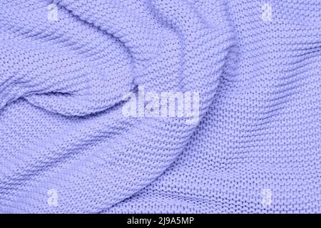 Zerknitterte Strickware als Hintergrund Stockfoto