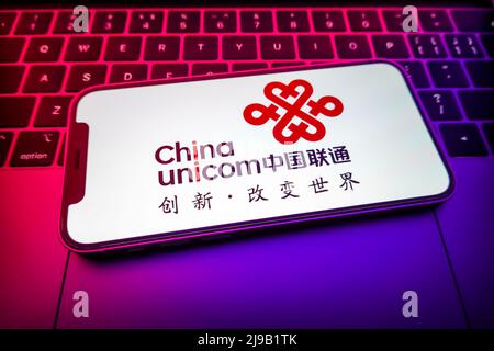 China. 19.. Mai 2022. In dieser Abbildung wird ein China Unicom-Logo auf dem Bildschirm eines Smartphones angezeigt. Kredit: SOPA Images Limited/Alamy Live Nachrichten Stockfoto