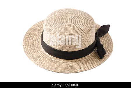 Strohhut mit kleiner Krempe und schwarzem Band. Canotier - Sommer Französisch Strohhut von starrer Form mit einer zylindrischen Krone und geraden, eher schmalen Rand. Konzept Sommer Mode Bekleidung Accessoires Stockfoto