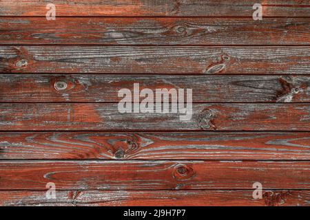 Vintage-Bretter mit den Resten der roten Farbstruktur Stockfoto