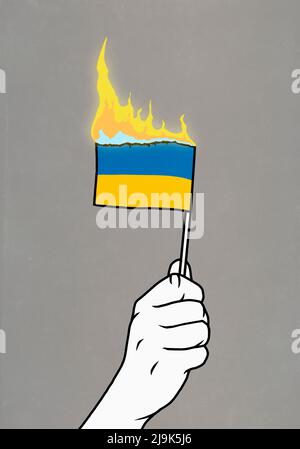 Hand hält die brennende Flagge der Ukraine Stockfoto