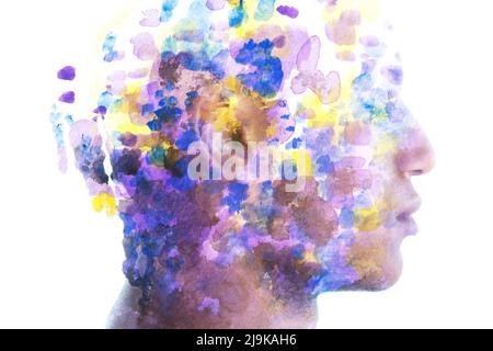 Paintographie. Bunte Farbspritzer kombiniert mit einem Porträt eines Mannes Stockfoto