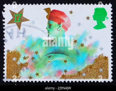 GROSSBRITANNIEN - UM 1985: Eine in Großbritannien gedruckte Briefmarke zeigt Genie, Weihnachtspantomime, um 1985 Stockfoto