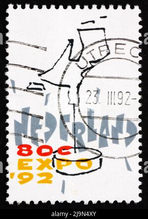 NIEDERLANDE - UM 1992: Eine in den Niederlanden gedruckte Briefmarke zeigt Dutch Map, EXPO 92, Sevilla, Spanien, um 1992 Stockfoto