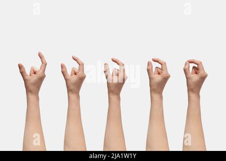 Handsatz mit Messsymbolen auf weiß isoliert. Stockfoto