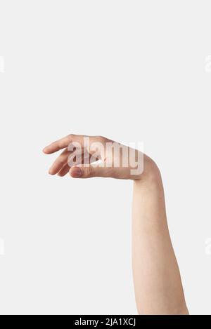 Nahaufnahme junge weibliche Hand müde Geste auf weiß. Stockfoto
