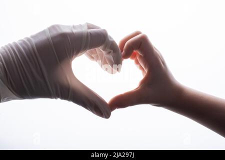 Steriler Schutzhandschuh. Handschuh zur Hand. Coronavirus COVID-19 Pandemiekonzept Stockfoto