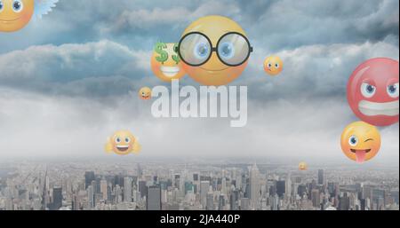 Bild von Emoji-Ikonen über der Stadtlandschaft Stockfoto