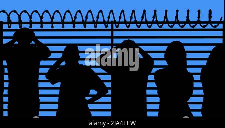 Bild von Menschen, die mit Stacheldraht vor dem Zaun stehen Stockfoto