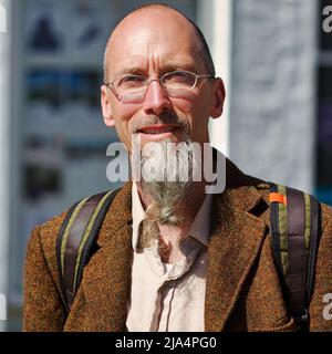 Mann mit Bart in Tweed-Jacke Stockfoto