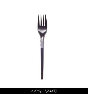 Ein schwarzes Plastikvolk auf weißem Hintergrund isoliert. Stockfoto