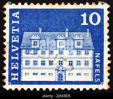 SCHWEIZ - UM 1968: Eine in der Schweiz gedruckte Briefmarke zeigt Freuler Mansion, Nafels, Schweiz, um 1968 Stockfoto