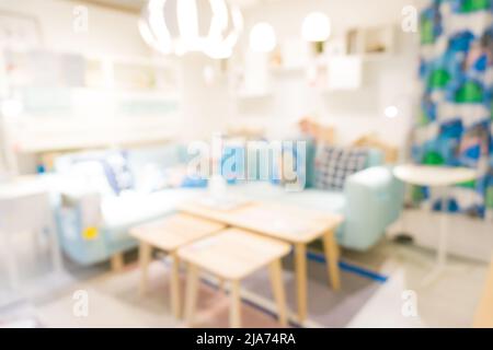 Verschwommener Supermarkt mit Möbeln Home Mart Hintergrund, Business Hintergrund Stockfoto