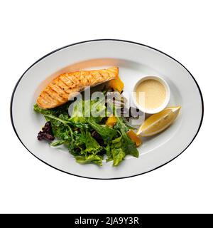 Isolierte Portion gegrilltes Lachssteak Stockfoto