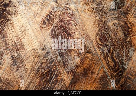 Grungige Parkettverkachelung aus dunkelbraunen Holzplanken, Draufsicht. Hintergrundtextur Stockfoto