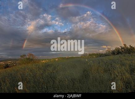 moody Regenbogen Sonnenuntergang über Bad Stockfoto