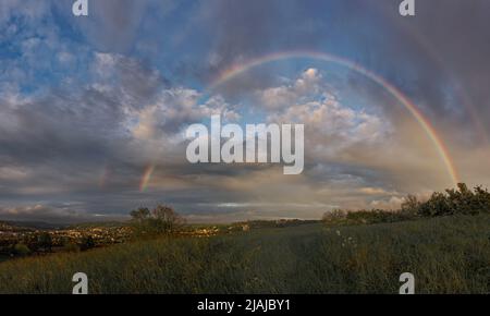 regenbogen über dem Bad Stockfoto