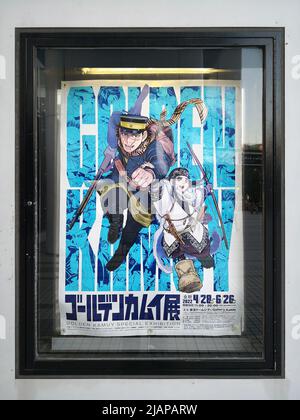 tokio, japan - dezember 24 2022: Werbeplakat für die Ausstellung der japanischen Abenteueranime-Serie Golden Kamui mit dem Hauptcharakter Stockfoto