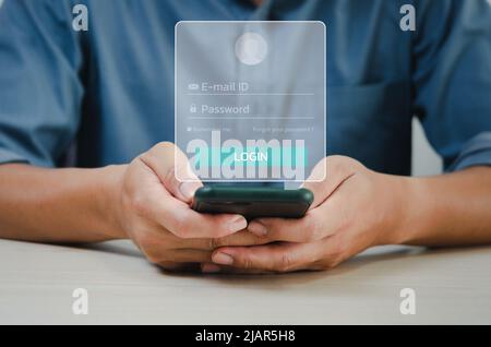 Mann mit Smartphone-Login-Passwort oder E-Mail Virtual Screen Concept-Technologie. Stockfoto