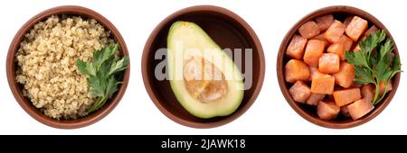 Avocado halbiert in einer Schale isoliert auf weißem Hintergrund, Draufsicht Stockfoto