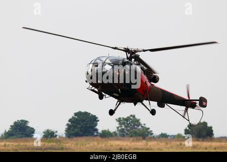 Leichter Militärhubschrauber Kommt An Land Stockfoto