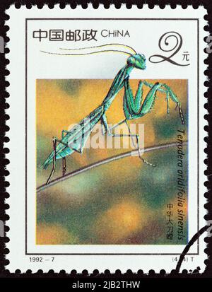 CHINA - UM 1992: Eine in China gedruckte Marke zeigt chinesische Mantis (Tenodera aridifolia sinensis), um 1992. Stockfoto
