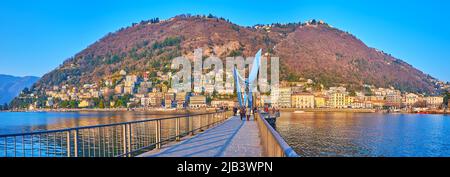 COMO, ITALIEN - 20. MÄRZ 2022: Panorama des Comer Sees, Monte Boletto, Piero Foranea Caldirola Staudamm und Electric Life Skulptur, am 20. März in Como Stockfoto