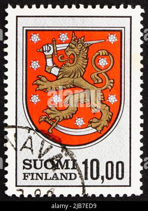 FINNLAND - UM 1974: Eine in Finnland gedruckte Briefmarke zeigt das finnische Wappen vom Grab von König Gustav Vasa, 1581, um 1974 Stockfoto