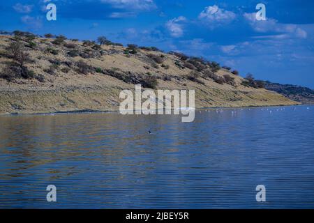 Der Magadi-See ist der südlichste See im Kenia Rift Valley und liegt in einem Einzugsgebiet von vulkanischen Felsen nördlich von Tansania Stockfoto