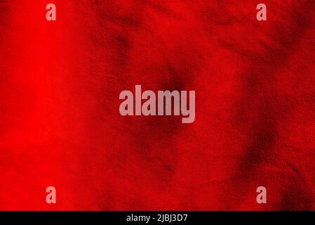 Roter matter Hintergrund aus Wildleder. Samtstruktur aus nahtlosem Leder. Rote Wildlederstruktur. Stockfoto