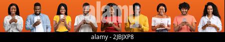 Coole App Gruppe Von Jungen Schwarzen Mit Smartphones Über Orange Hintergrund Stockfoto