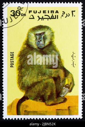 FUJEIRA - UM 1972: Eine im Fujeira gedruckte Marke zeigt Affen, Serie Affen, um 1972 Stockfoto