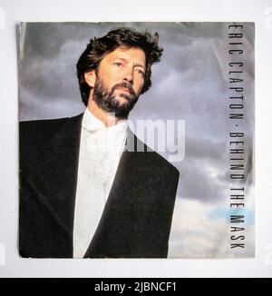 Bildercover der sieben-Zoll-Single-Version von Behind The Mask von Eric Clapton, die 1987 veröffentlicht wurde Stockfoto