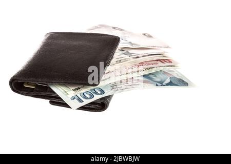 Türkische Lira in einer Geldbörse isoliert auf Weiß Stockfoto