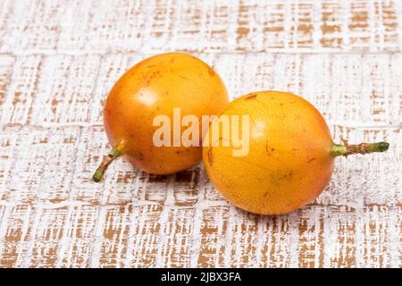 Passiflora Ligularis - Granadilla Oder Chinesischer Granatapfel; Leckere Und Gesunde Früchte Stockfoto