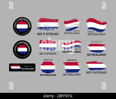 Aufkleberset. Hergestellt in den Niederlanden. Pinselstriche mit holländischer Flagge. Fabrik-, Fertigungs- und Produktionslandkonzept. Designelement für Stock Vektor
