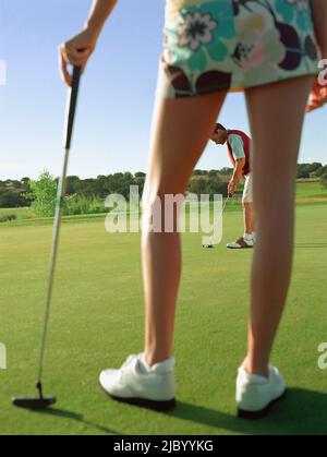 Paar, Golfen Stockfoto