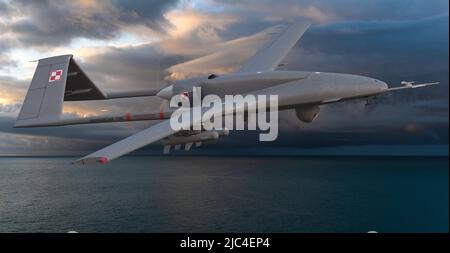 Türkische Kampfdrohne Bayraktar TB 2 in den Farben der polnischen Streitkräfte bei einem Flug über das Meer Stockfoto