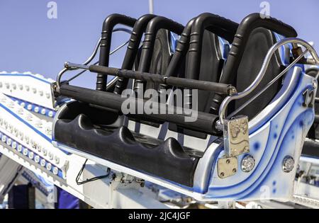 Detail der Sicherheitssitze auf einer Messe in der Stadt Stockfoto