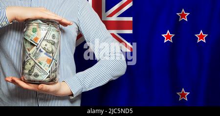 Neuseeland Flagge und US-Dollar Bargeld, Wechselkurse Konzept Stockfoto