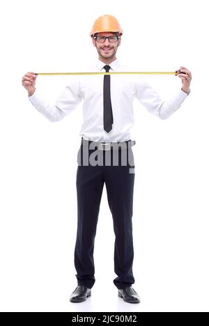 Im vollen Wachstum. Der junge Architekt mit gelbem Maßband Stockfoto