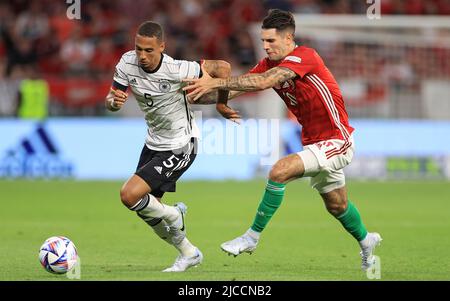 Ungarn gegen Deutschland: UEFA Nations League - League Path Group 3 BUDAPEST, UNGARN - 11. JUNI: Thilo Kehrer von Deutschland fordert Dominik Szoboszlai von Ungarn während der UEFA Nations League Ein Gruppe-3-Spiel zwischen Ungarn und Deutschland in der Puskas Arena am 11. Juni 2022 in Budapest, Ungarn. Kredit: Alamy Live Nachrichten, Gabriella Barbara Stockfoto