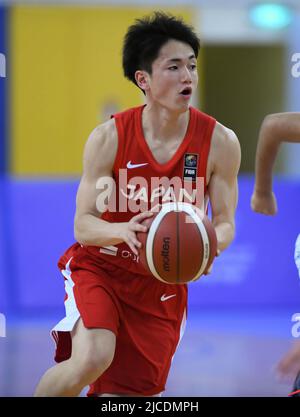 Doha, Katar. 12.. Juni 2022. Suguru Ishiguchi vom japanischen Basketballteam in der Al-Gharafa Sports Multi-Purpose Hall in Aktion beim Asienmeisterschaftsspiel 2022 zwischen Kuwait und Japan bei der FIBA U16. Endergebnis; Japan 98:33 Kuwait. (Foto von Luis Veniegra/SOPA Images/Sipa USA) Quelle: SIPA USA/Alamy Live News Stockfoto